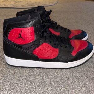 Nike Jordans Black and Red High-Top Sneakers with Jumpman Logo